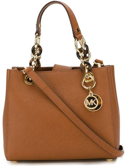 buy real michael kors logo charm with brown leather strap|michael kors woman.